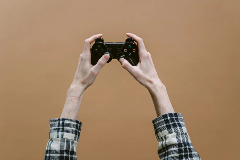 Ilustrasi konsol PlayStation dengan antarmuka game digital